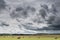 Eastern freestate landscape with haybales and a stormy sky