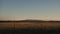 Eastern Oklahoma scenery with mountains, field and hay bale