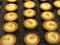 Easy and Delicious homemade cream cheeses tart on oven tray ready to bake , mango cheeses pie, dozen of cream chesses tart