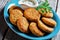 Easy fish cakes on a plate with tartar sauce