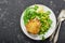 Easy healthy lunch: chicken thigh with mashed green peas and corn salad on a light background. Top view