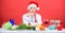 Easy ideas for christmas party. Woman chef santa hat cooking at kitchen. Best christmas recipes of perfect housewife