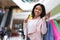 Easy Payments. Black Woman With Credit Card And Shopping Bags In Mall