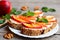 Easy sandwiches with cream cheese, fresh nectarines, walnuts and mint on a plate and on a vintage wooden table