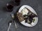 Easy snack - baked beetroot, goat\'s cheese and red wine. On a dark background