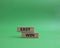 Easy win symbol. Wooden blocks with words Easy win. Beautiful green background. Business and Easy win concept. Copy space