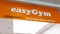 EasyGym logo brand and sign text of gymnasium fitness club easy gym