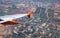 EasyJet aircraft winglet above aerial bird view on Central Dis