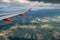 EasyJet aircraft winglet above aerial bird view on Switzerland