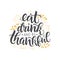 Eat, drink and be thankful vector lettering quote. Handwritten greeting card template for Thanksgiving day.