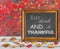 Eat drink and be thankful written inside picture frame