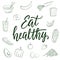 Eat healthy! Calligraphic quote and food drawings on background.