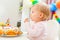 Eat smeared kid eating birthday cake