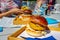 Eating burger on social event with friends together in a restautant outdoor on a board