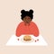 Eating disorder. Sad african woman looks at hamburger and worries about being overweight. Overeating, bulimia, anorexia