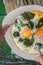 Eating Florentine eggs with purred spinach vertical