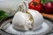 Eating of fresh handmade soft Italian cheese from Puglia, white balls of burrata or burratina cheese made from mozzarella and