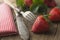 Eating fresh strawberries, vintage cuttlery fork and knife. Healthy diet and slim figure, breakfast or healthy snack. Detox and