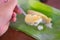 Eating sticky rice with steamed custard