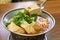 Eating stinky tofu hot pot with spicy soup