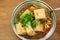 Eating stinky tofu hot pot with spicy soup