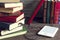 Ebook and old books on wooden table