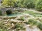 The Ebro river and waterfall that arises from the Cueva del Agua, in Orbaneja del Castillo, in Burgos