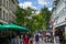 Echternach, Luxembourg; 08/11/2018: Narrow street in old town of Echternach, in Luxembourg, Europe. Typical houses with flags and