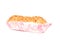 Eclair with a cream on a white background
