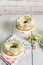 Eclair rings with a cream and canned peaches