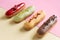 Eclairs cupcake on a minimal background. Still life hello summer mood. Concept baking, cookbook recipes, bakery banner, cafe