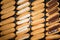 Eclairs with glaze on a white wooden table