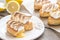 Eclairs with lemon curd and meringue