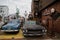 Eclectic Americana Scene with Classic Cars and Quirky Outdoor Decor