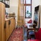 Eclectic style kitchen with retro carpet