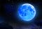 Eclipse of blue moon on night starry sky. Astronomical natural phenomenon.