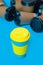 Eco coffe cup and multiple single use cardboard cups.Defocused photo.