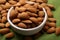 Eco conscious snack almonds on canvas napkin, green background perfection