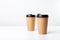 Eco craft coffee cups on white background