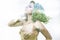 Eco Deity, beautiful woman with green hair in golden goddess arm