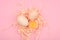 Eco eggs on a pink background. minimalistic trend, top view. Egg tray. Easter concept