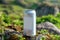 Eco-Friendly Beverage Can in Sunlit Forest Natural Setting
