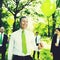 Eco-Friendly Business People Holding Green Balloons Concept