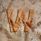 Eco friendly cardboard letter w , lowercase grunge recycled alphabet, design element