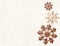 Eco friendly Christmas. Christmas background with wooden snowflakes on handmade paper. Copy space for text. Ecology, environmental