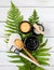 Eco-friendly cosmetics. face mask, scrub and bath salt on fern leaves. natural skincare medical treatment therapy