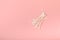 Eco-friendly cotton swab, bamboo cotton buds on a pink background.