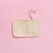 Eco friendly  dish washing sponge on pink background