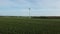 eco-friendly power generation, wind power generator, wind farm standing in a field