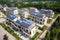 Eco-friendly residential complex powered by solar energy. Generative ai